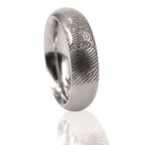 Zilveren ring met vingerafdruk bol met drie stenen